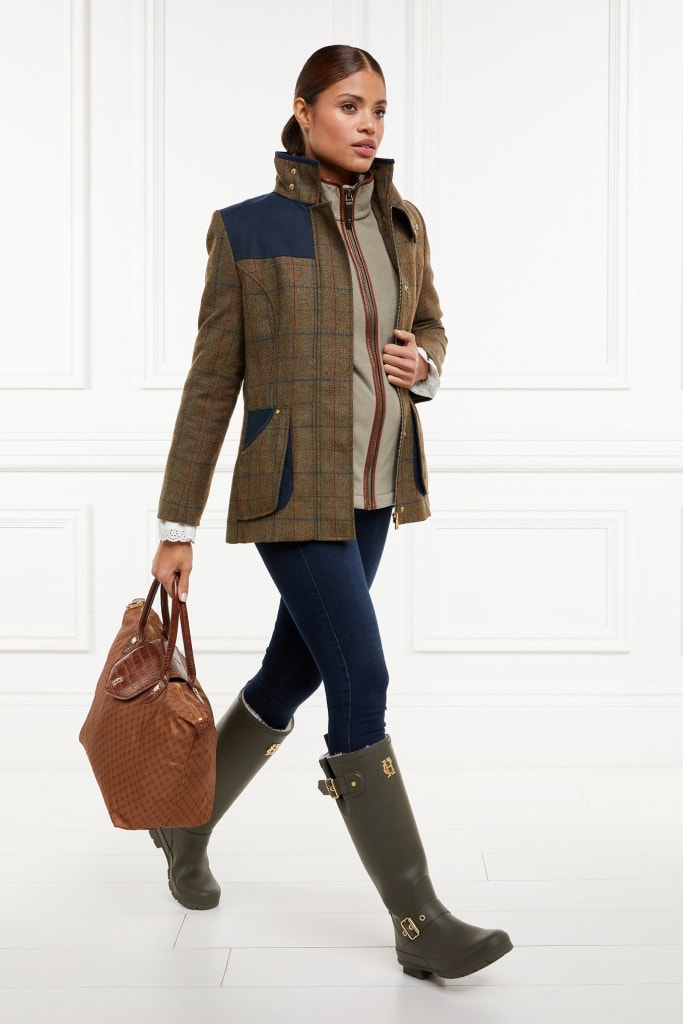Holland Cooper model wearing Field Blazer, Country Gilet, Wellingtons and holding a Regency Packable Tote.
